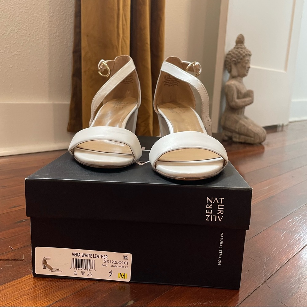 Worn once for wedding. In box with original packaging